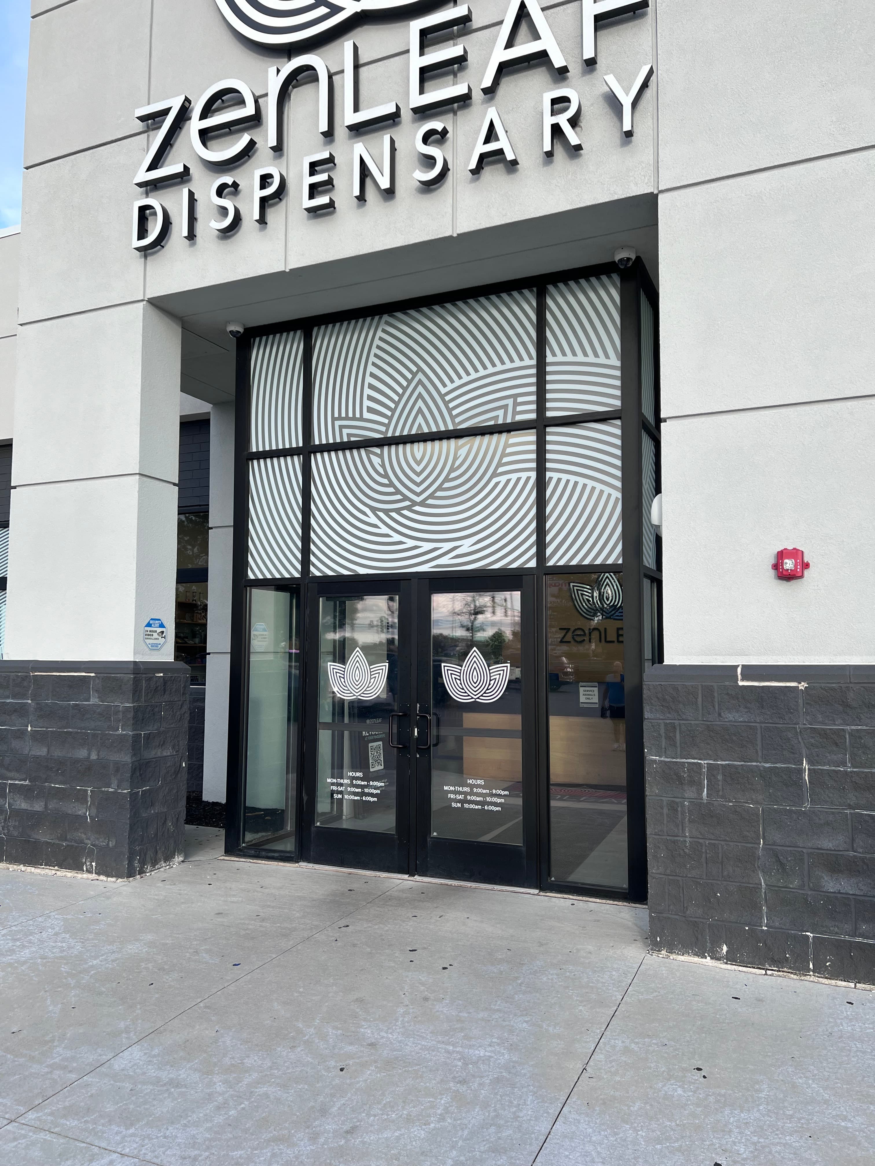 Dispensary storefront security vinyl installation, wet application