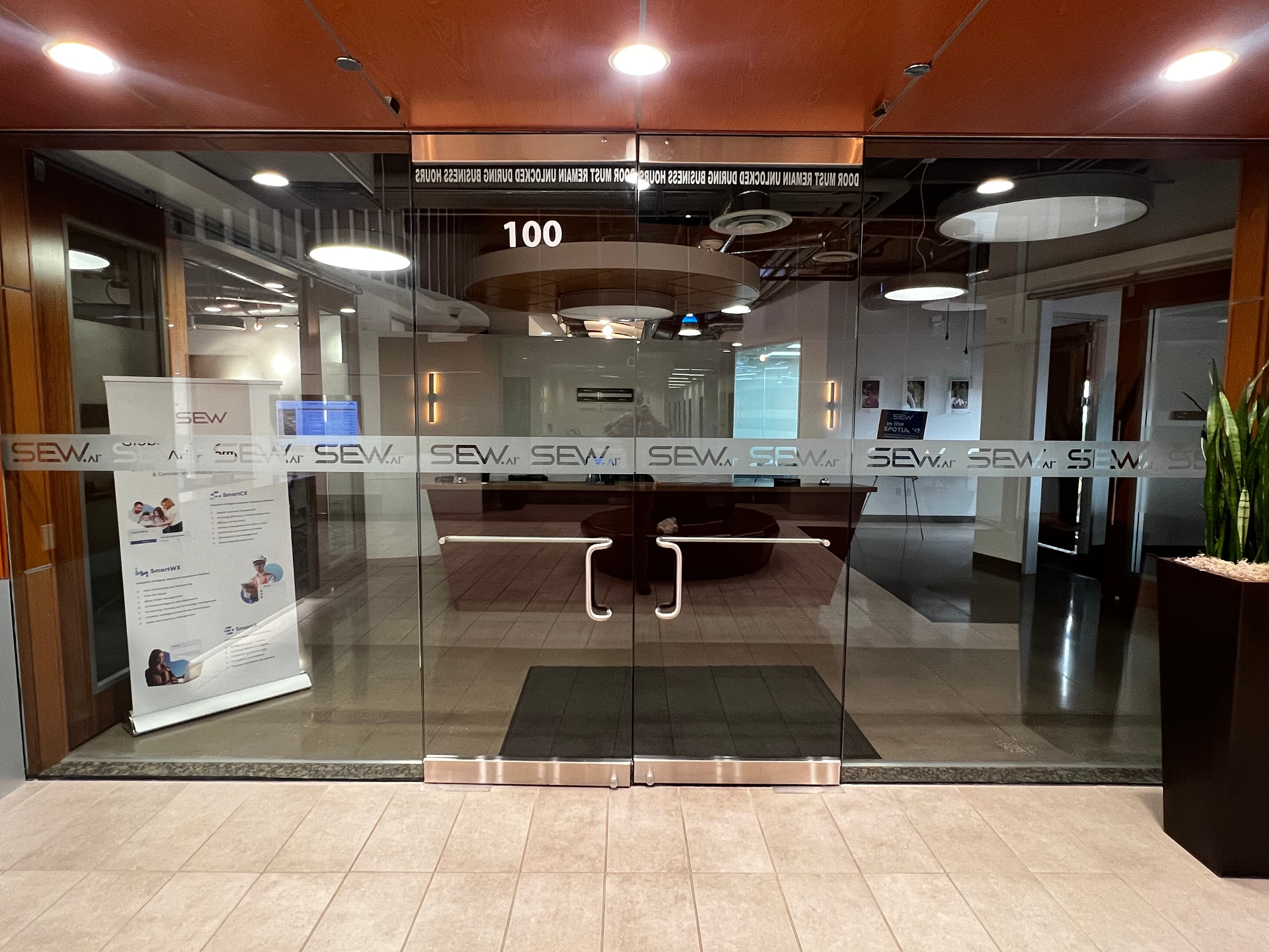 Office front belly band – frosted vinyl installation